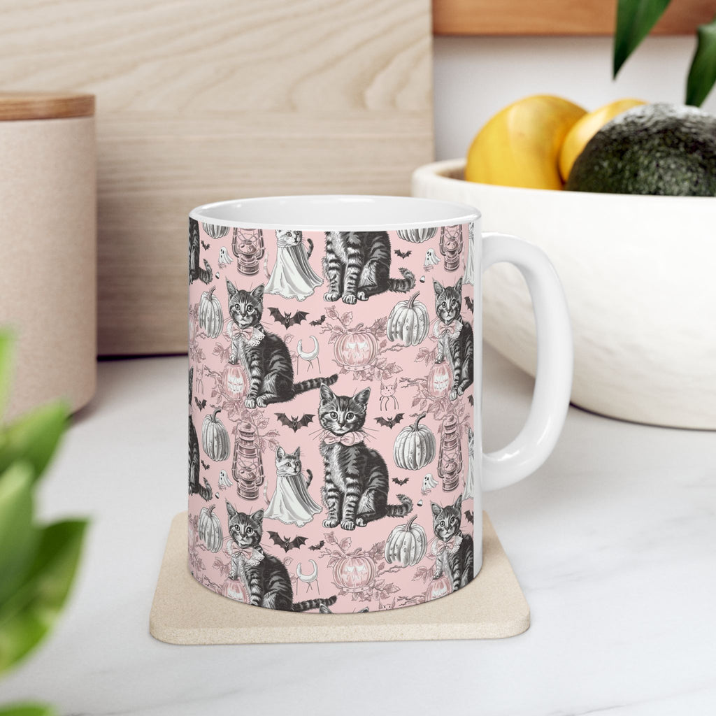 Blush Vintage Halloween Cat Mug – Cozy Pink Coffee Cup with Ghosts, Pumpkins & Black Cats